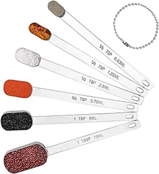 six stainless steel spoons